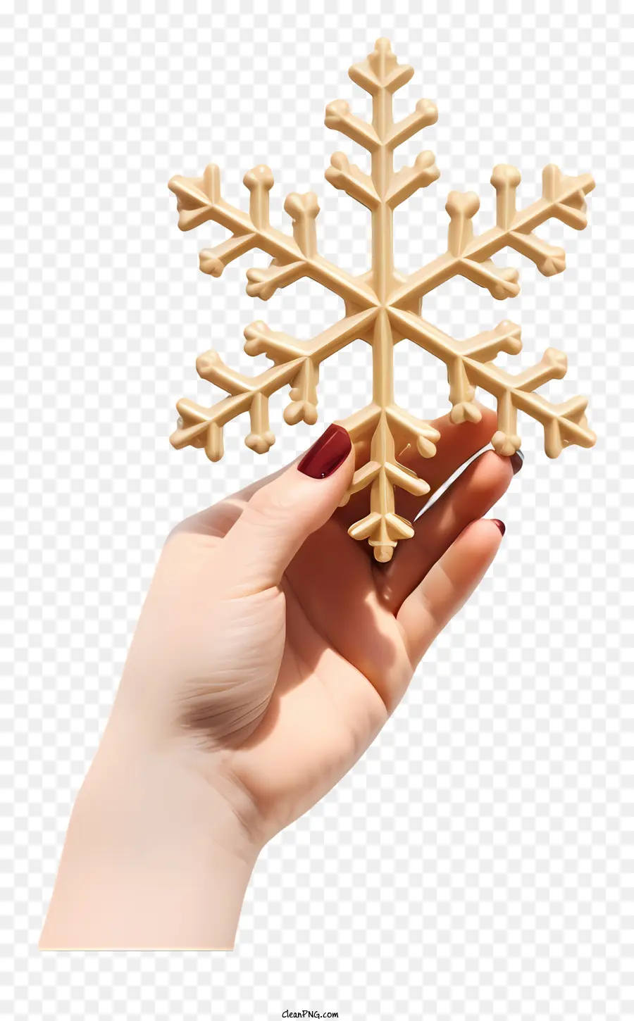 bông tuyết - Tay phụ nữ cầm bông tuyết kim loại vàng
