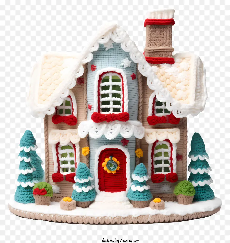crocheted house christmas theme thatched roof snow-covered lawn light colored wood