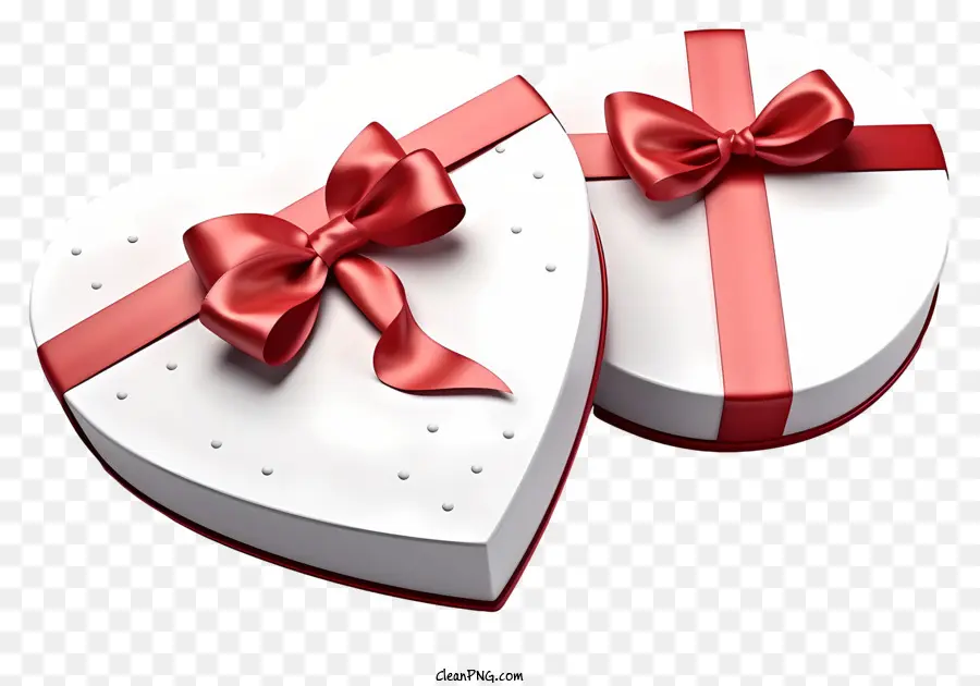 scatola regalo - Due scatole regalo a forma di cuore legate al nastro