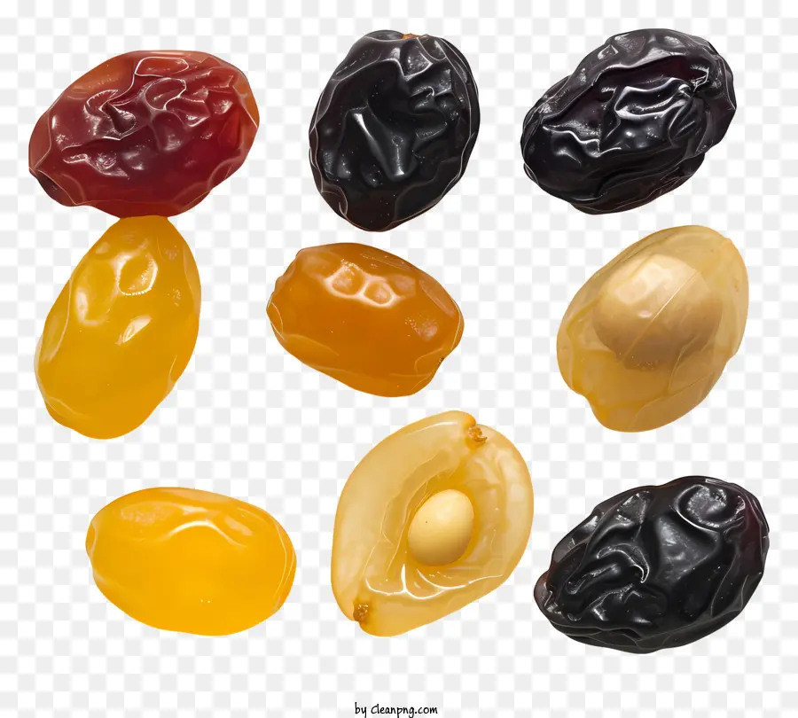frutti secchi asciutti di uvetta da frutta secca fichi secchi - Primo piano di vari frutti secchi, dimensioni e colori diverse